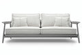 **Nowoczesna sofa z metalowymi detalami w kolorze jasnoszarym**